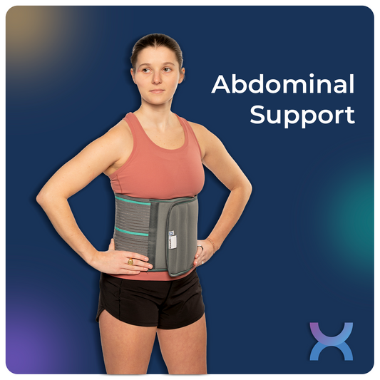 Woman demonstrating an abdominal support belt