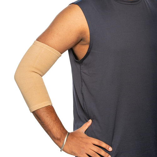 Man showing elbow brace for right hand 				