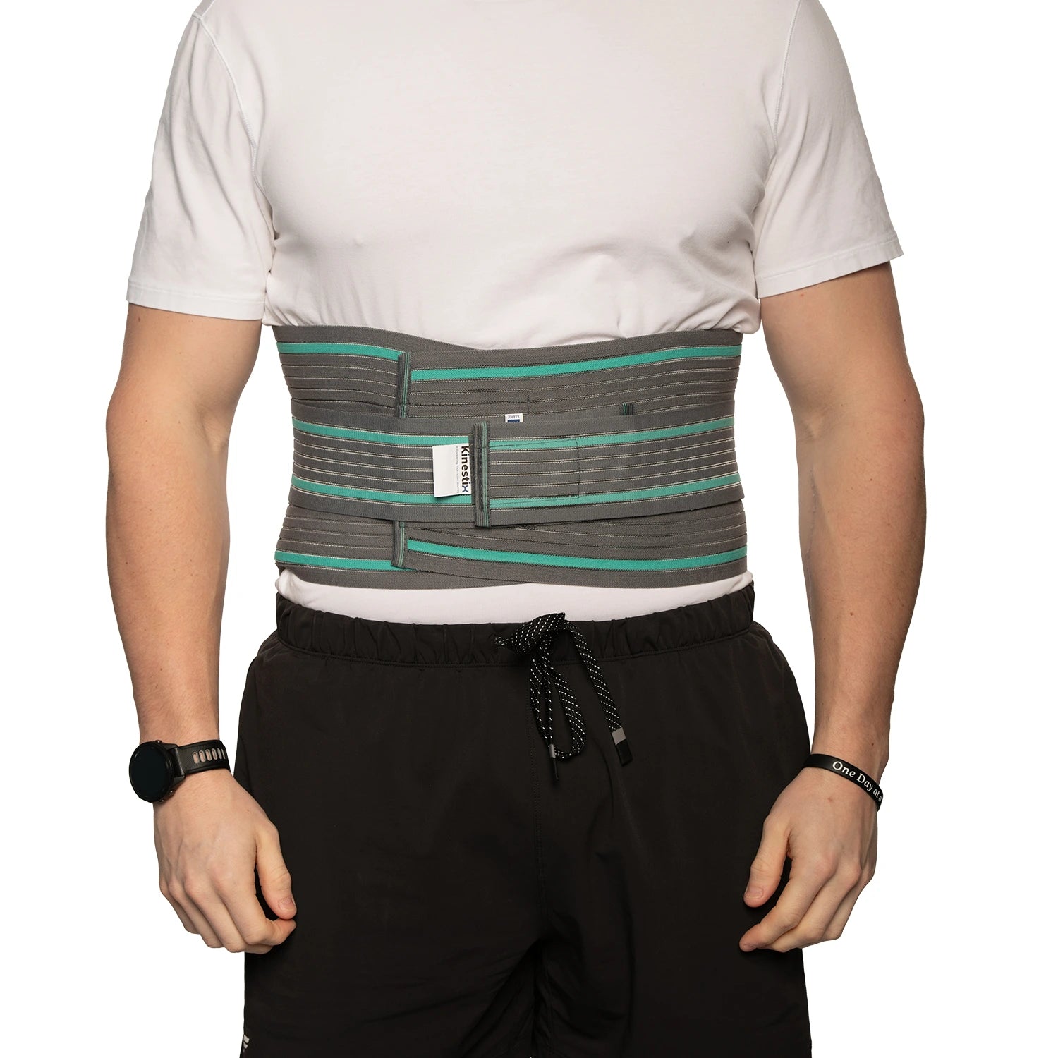 Man demonstrating the lumbar Sacro support belt				